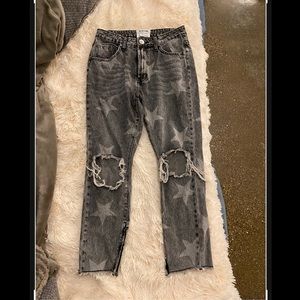 Free People size 29 distressed denim, with zippers on the ankle